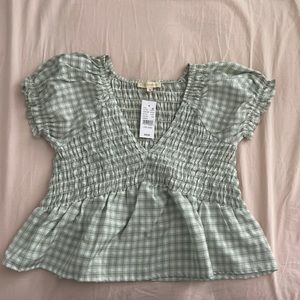 Green and white babydoll style shirt